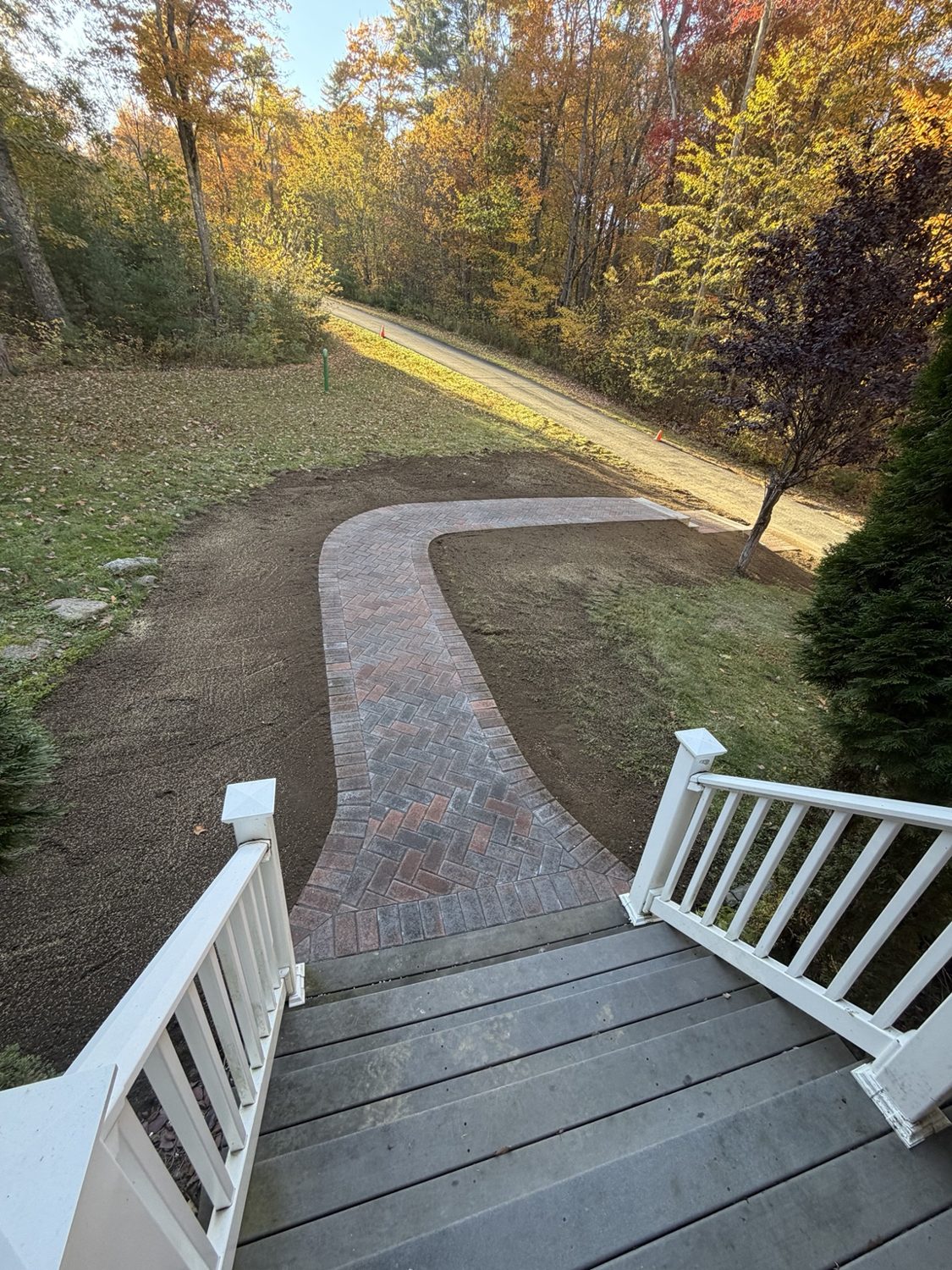 Curving brick paver walkway