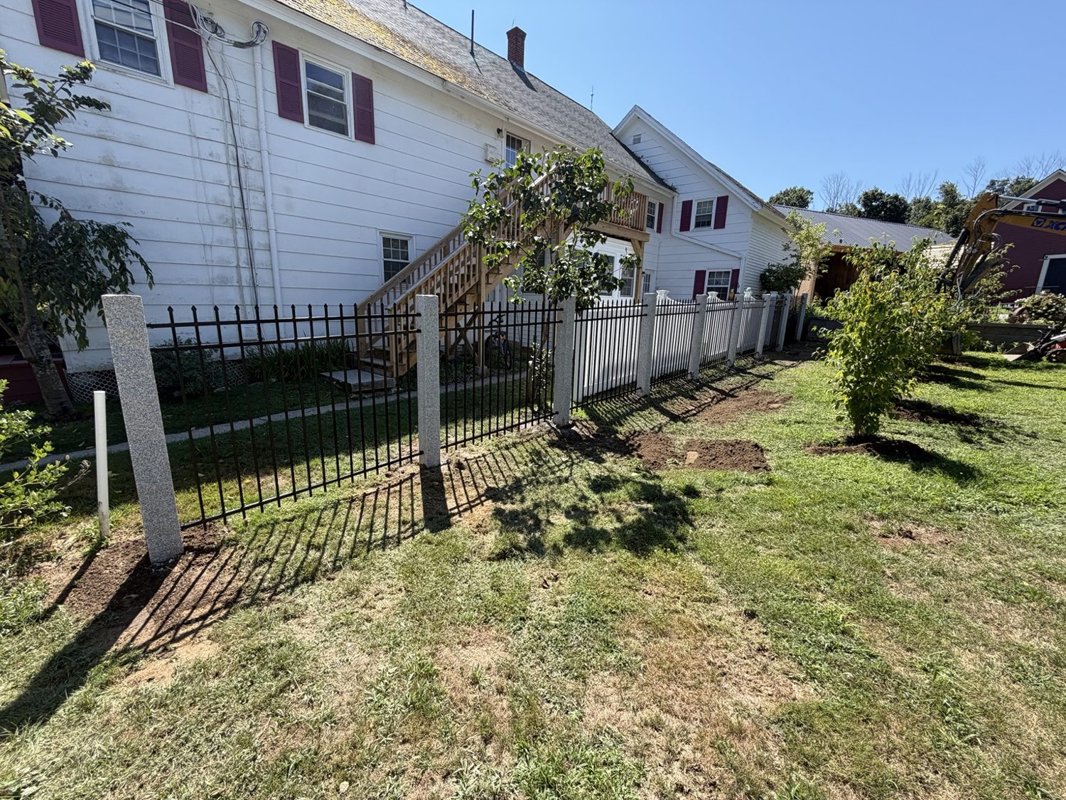 Decorative fencing and granite posts