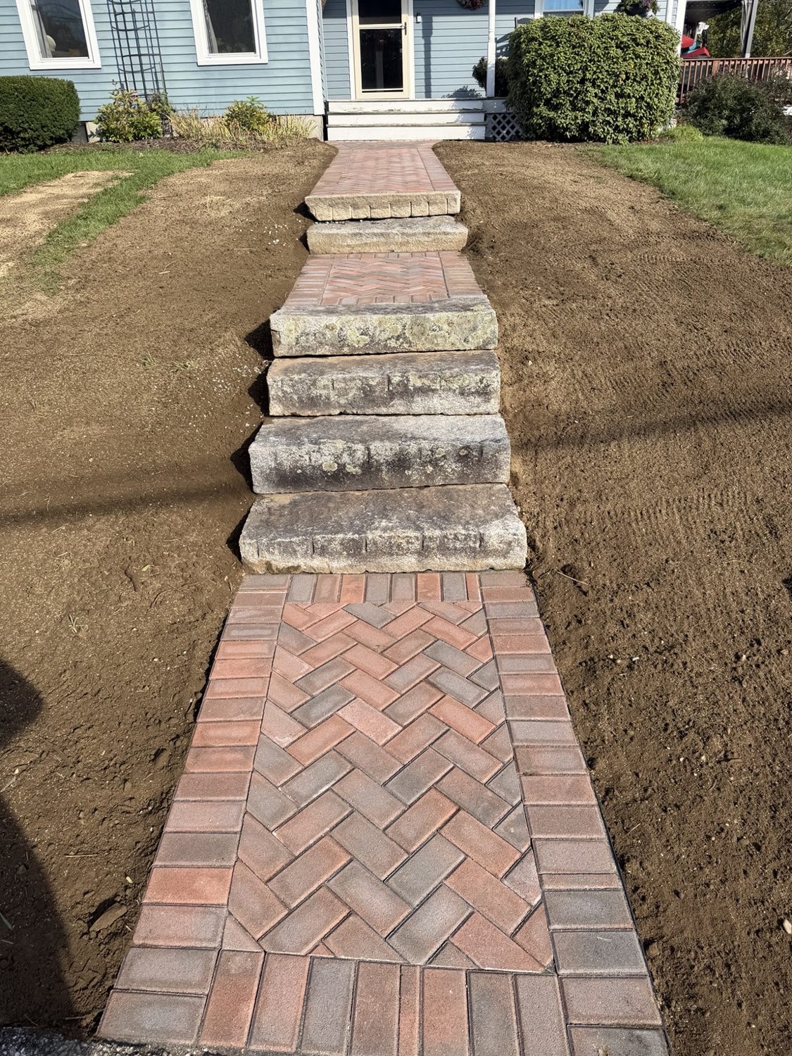 Brick walkway and stone steps