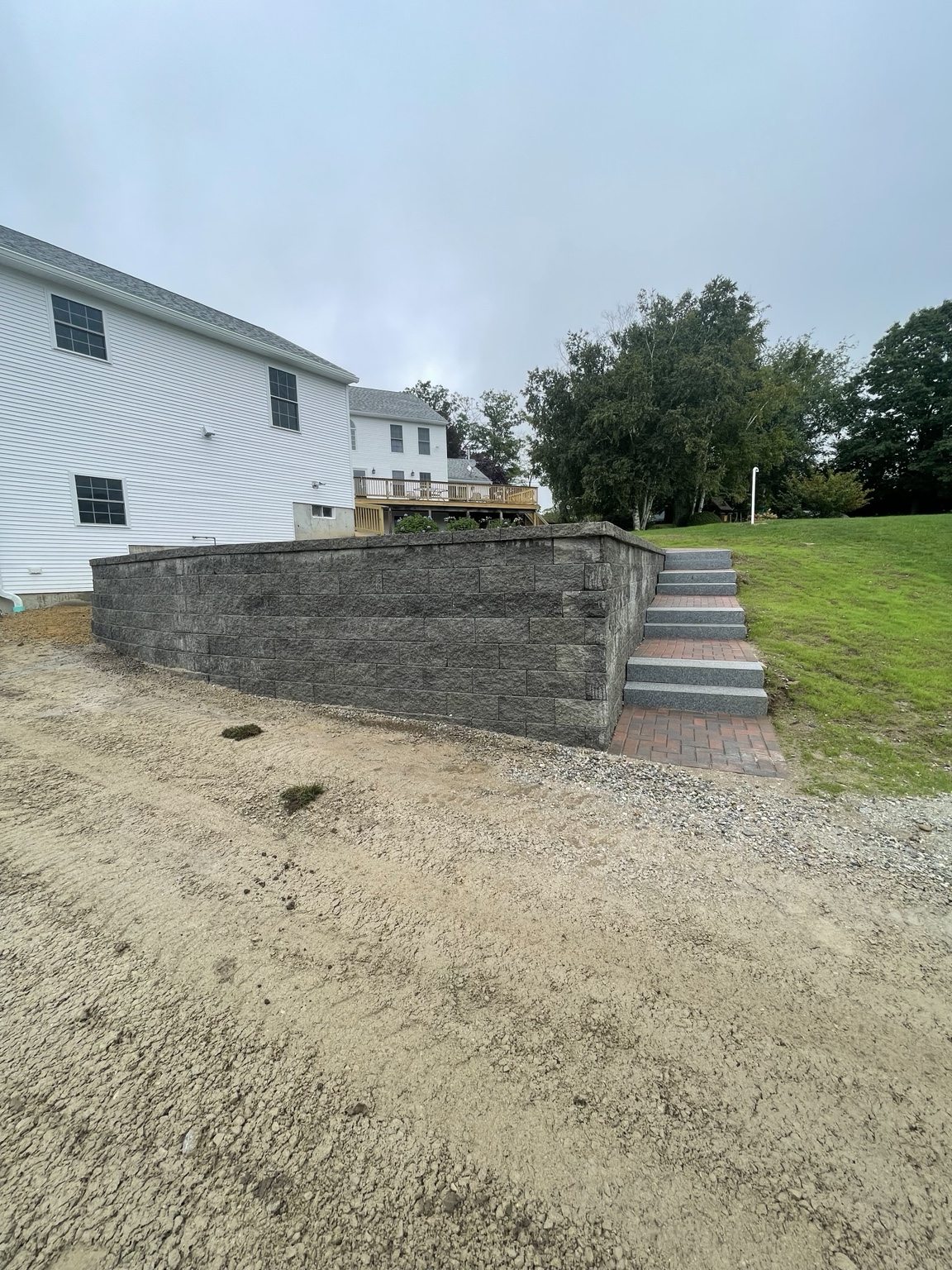 Retaining wall with granite steps