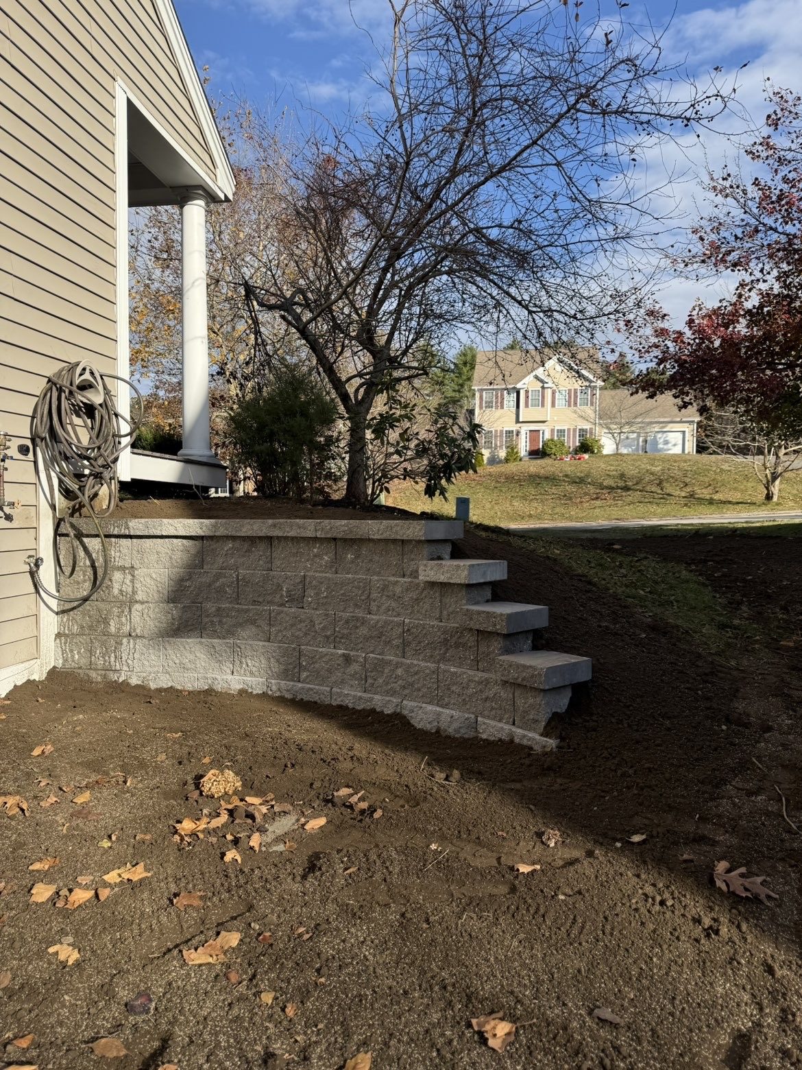 Retaining wall with integrated steps