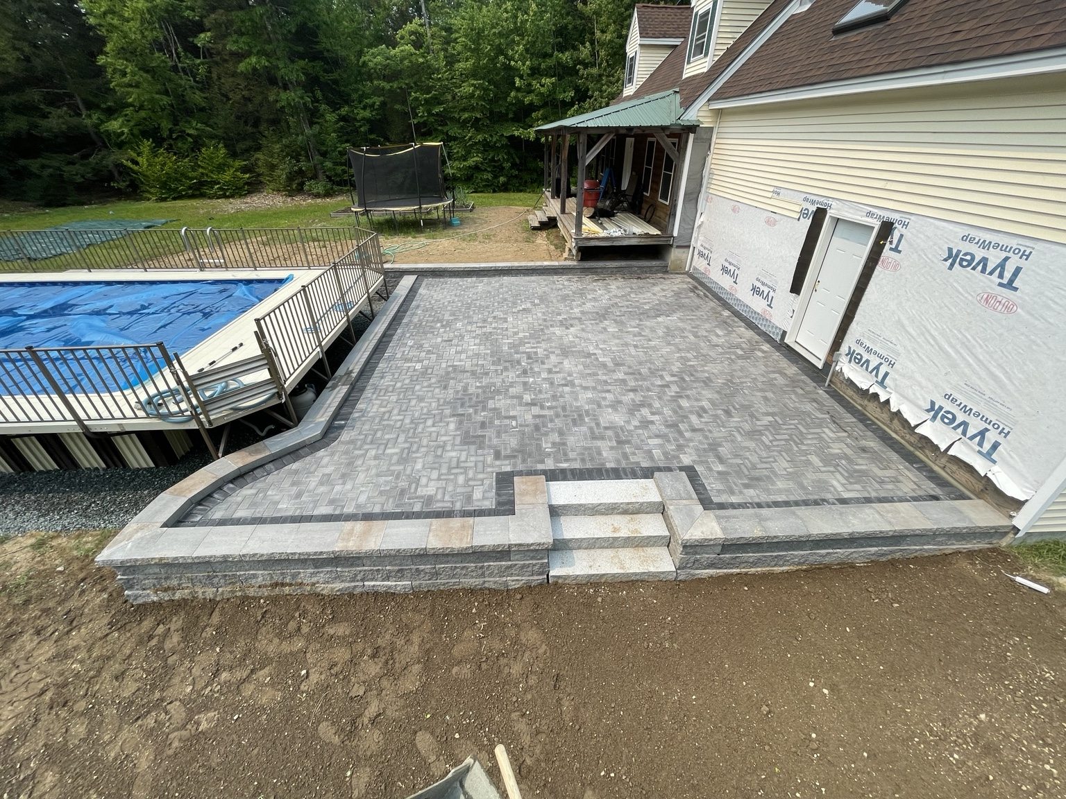 Poolside paver patio