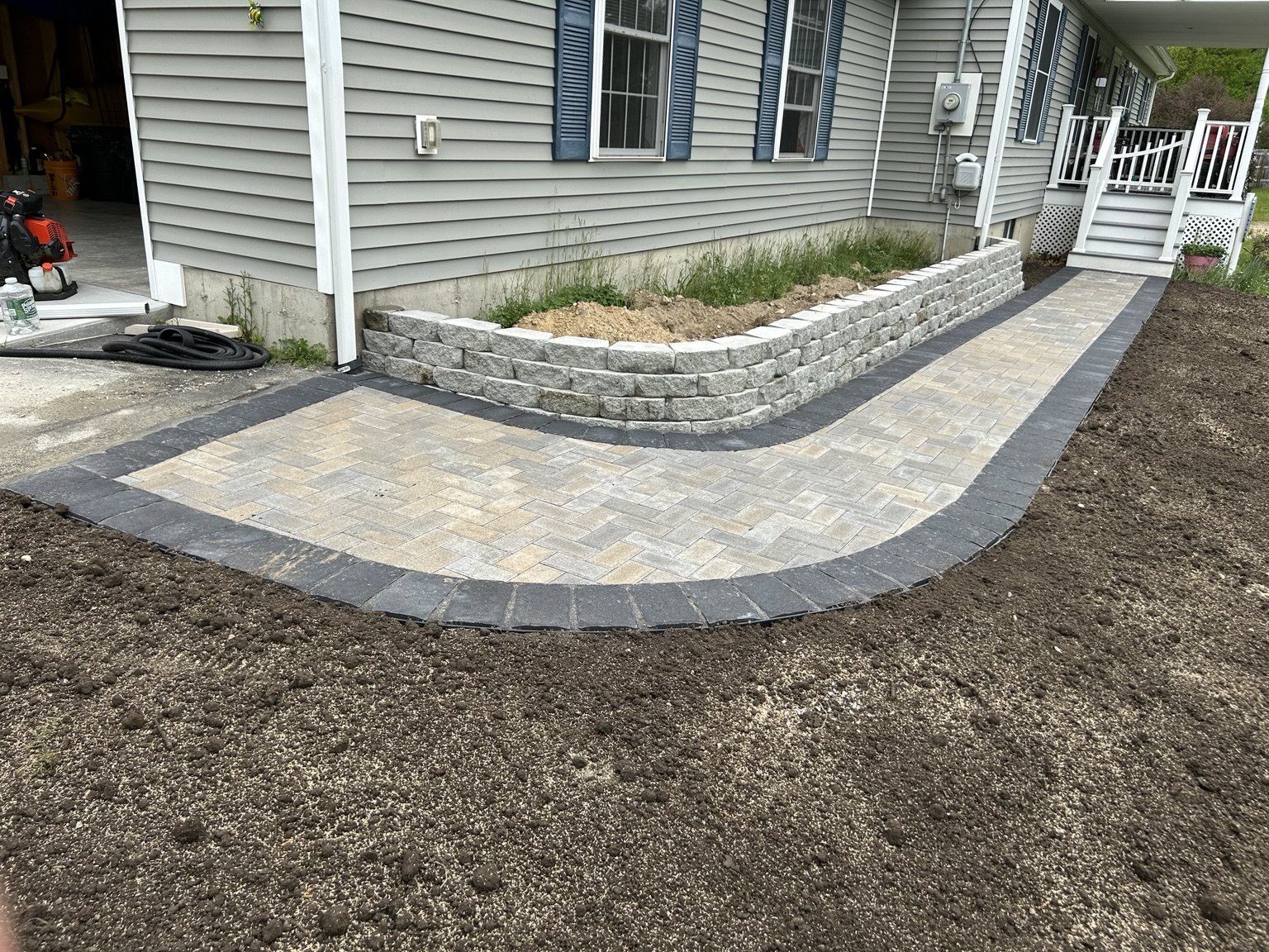 Paver walkway and retaining wall